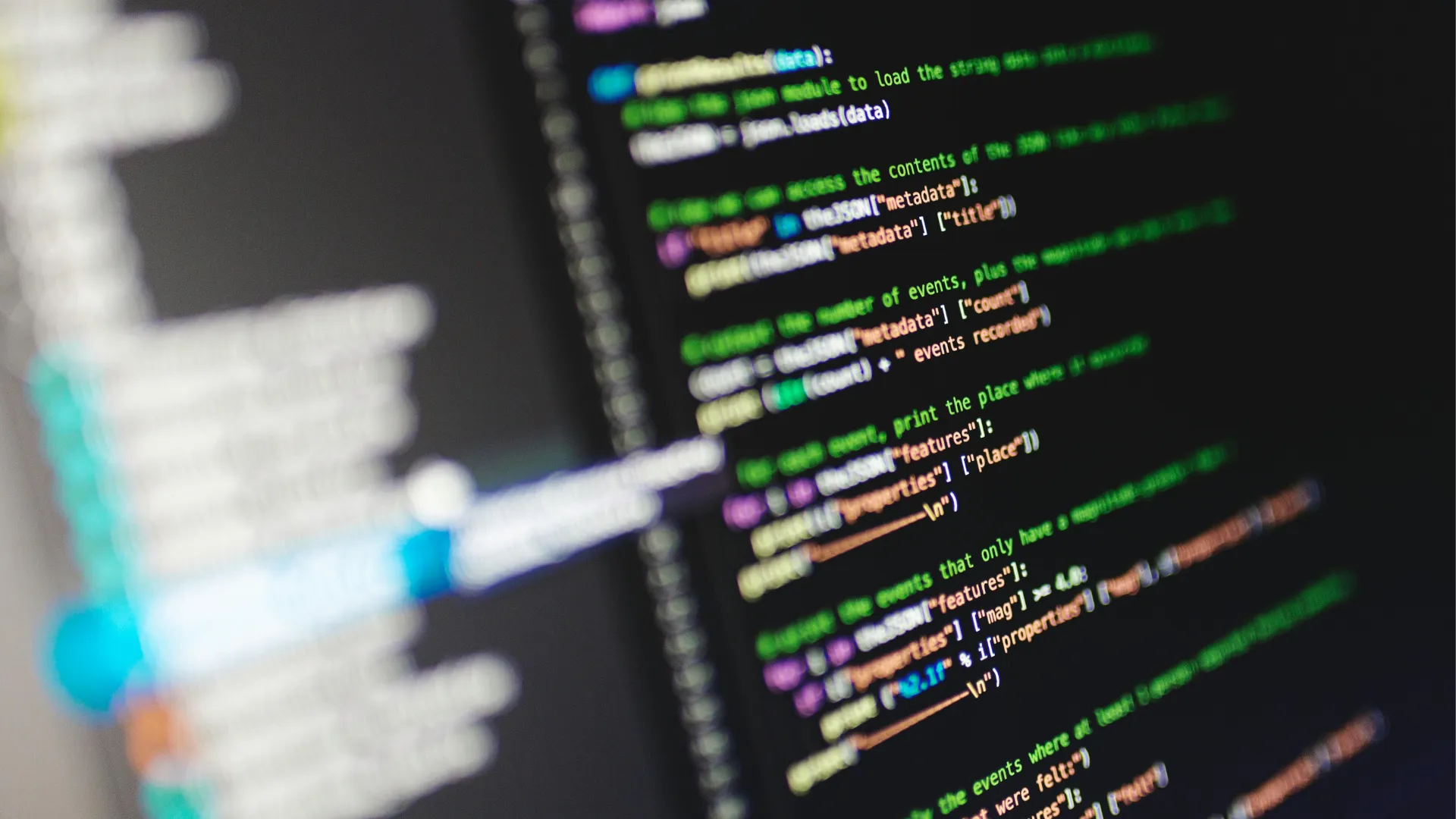 Close-up of colourful programming code on a computer screen